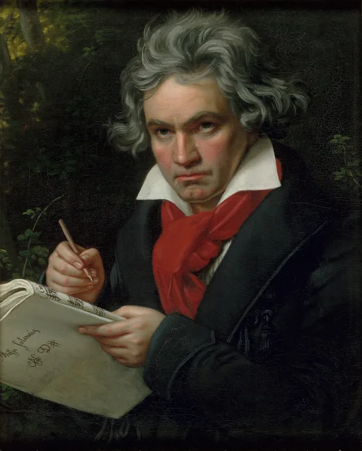 Beethoven mit einer Notenhandschrift in der Hand